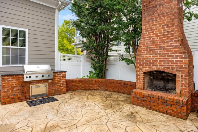 8650 Homecoming Dr, Chattanooga, TN 37421 - view of patio / terrace with an outdoor brick fireplace