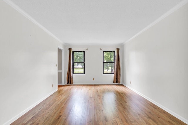 2434 Haven Cove Ln, Chattanooga, TN 37421 - empty room featuring light wood-type flooring, baseboards, and crown molding