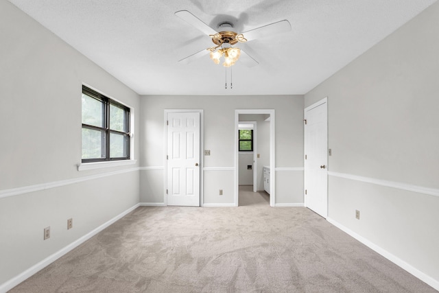2434 Haven Cove Ln, Chattanooga, TN 37421 - unfurnished bedroom with carpet flooring, baseboards, and a ceiling fan