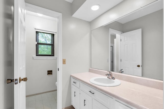 2434 Haven Cove Ln, Chattanooga, TN 37421 - bathroom with vanity, toilet, and baseboards