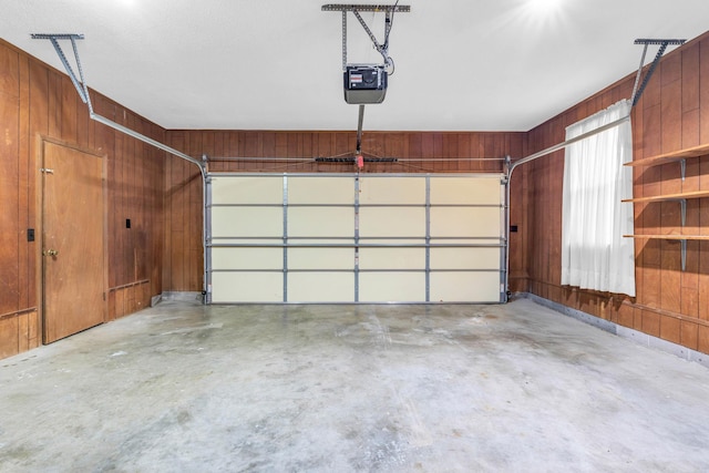 2434 Haven Cove Ln, Chattanooga, TN 37421 - garage with a garage door opener and wooden walls