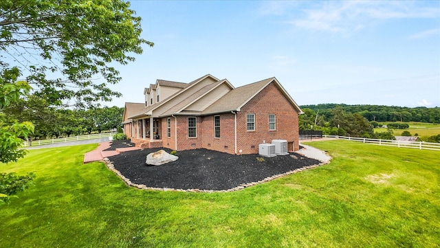 727 E Dumplin Valley Rd, Jefferson City, TN 37760 - view of side of property featuring central air condition unit, brick siding, and a patio area