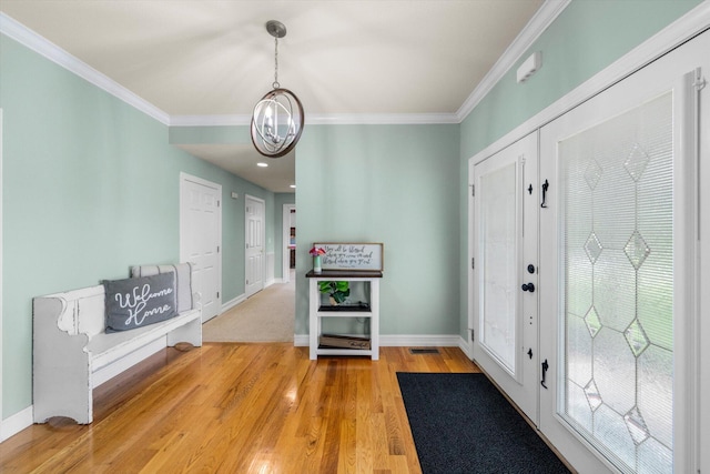 727 E Dumplin Valley Rd, Jefferson City, TN 37760 - entryway featuring ornamental molding, light wood-style flooring, baseboards, and a chandelier