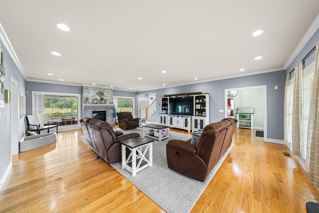 727 E Dumplin Valley Rd, Jefferson City, TN 37760 - living area featuring recessed lighting, light wood-style flooring, a fireplace, crown molding, and baseboards