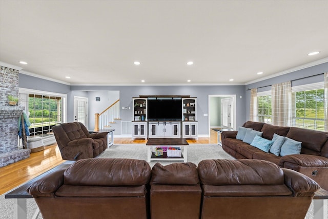 727 E Dumplin Valley Rd, Jefferson City, TN 37760 - living area featuring light wood-type flooring, stairway, ornamental molding, and recessed lighting