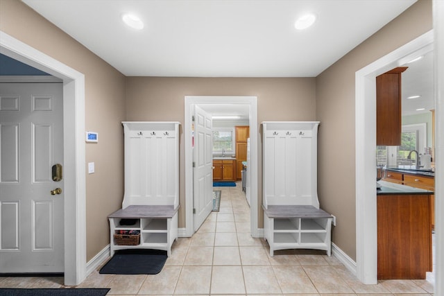 727 E Dumplin Valley Rd, Jefferson City, TN 37760 - mudroom featuring healthy amount of natural light, light tile patterned floors, a sink, baseboards, and recessed lighting