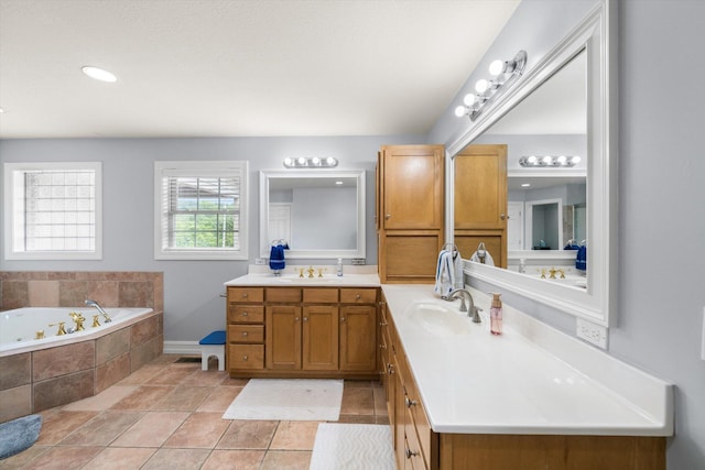 727 E Dumplin Valley Rd, Jefferson City, TN 37760 - bathroom featuring double vanity, a tub with jets, and baseboards