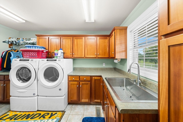 727 E Dumplin Valley Rd, Jefferson City, TN 37760 - laundry room featuring cabinet space, washer and clothes dryer, and light tile patterned floors