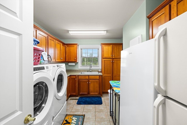 727 E Dumplin Valley Rd, Jefferson City, TN 37760 - washroom with washing machine and dryer, cabinet space, and light tile patterned floors
