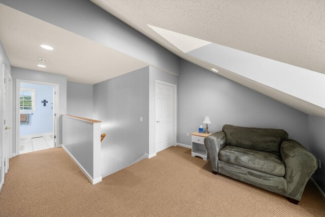 727 E Dumplin Valley Rd, Jefferson City, TN 37760 - living area with an upstairs landing, carpet, recessed lighting, a skylight, and baseboards