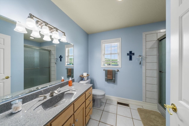 727 E Dumplin Valley Rd, Jefferson City, TN 37760 - full bath featuring a shower stall, vanity, tile patterned flooring, toilet, and baseboards