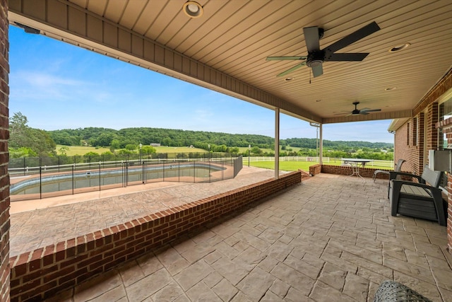 727 E Dumplin Valley Rd, Jefferson City, TN 37760 - view of patio with a ceiling fan and a forest view