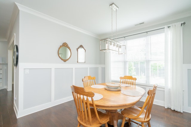 2062 Belleau Village Ln, Chattanooga, TN 37421 - dining space with crown molding, a decorative wall, wood finished floors, and a wainscoted wall