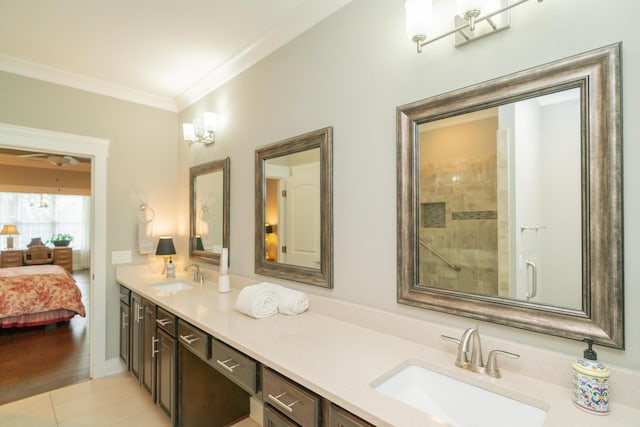 2062 Belleau Village Ln, Chattanooga, TN 37421 - full bathroom featuring double vanity, ornamental molding, connected bathroom, tile patterned floors, and tiled shower