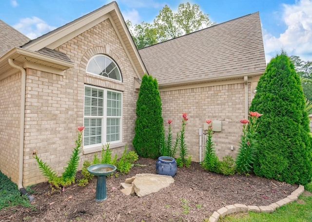 2062 Belleau Village Ln, Chattanooga, TN 37421 - view of side of property with roof with shingles and brick siding