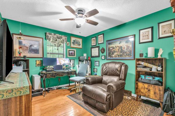 270 Rolling Meadows Dr, Ringgold, GA 30736 - office featuring ceiling fan, wood finished floors, and a textured ceiling