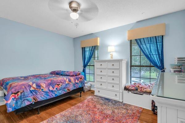 270 Rolling Meadows Dr, Ringgold, GA 30736 - bedroom with wood finished floors and a ceiling fan