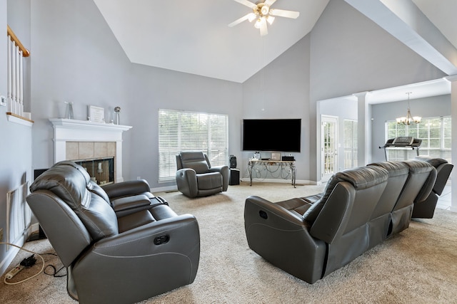 8021 Hamilton Mill Dr, Chattanooga, TN 37421 - living room with high vaulted ceiling, decorative columns, carpet, ceiling fan, and a chandelier