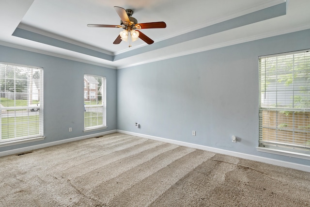 8021 Hamilton Mill Dr, Chattanooga, TN 37421 - carpeted spare room featuring a tray ceiling, ornamental molding, baseboards, and a ceiling fan