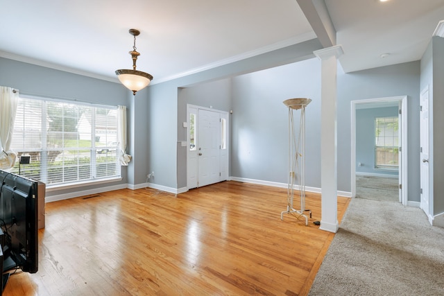 8021 Hamilton Mill Dr, Chattanooga, TN 37421 - foyer entrance with baseboards, ornamental molding, light wood-style flooring, and decorative columns