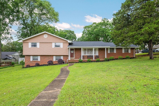 9 Maple Ln, Fort Oglethorpe, GA 30742 - tri-level home featuring covered porch, brick siding, and a front yard