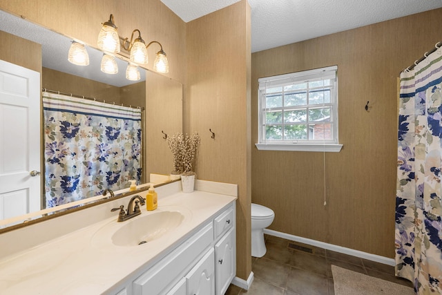9 Maple Ln, Fort Oglethorpe, GA 30742 - full bathroom with toilet, vanity, tile patterned flooring, a textured ceiling, and a shower with shower curtain