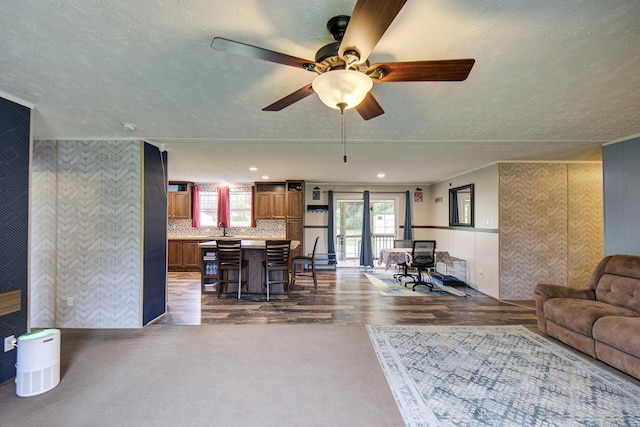 452 Davenport Rd, Resaca, GA 30735 - living area with ceiling fan, a textured ceiling, and dark wood finished floors