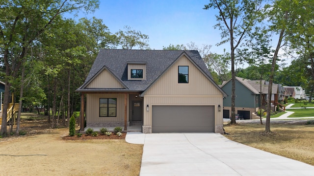 300 Dogwood Ln, Fort Oglethorpe, GA 30742 - modern farmhouse featuring concrete driveway, roof with shingles, and a garage