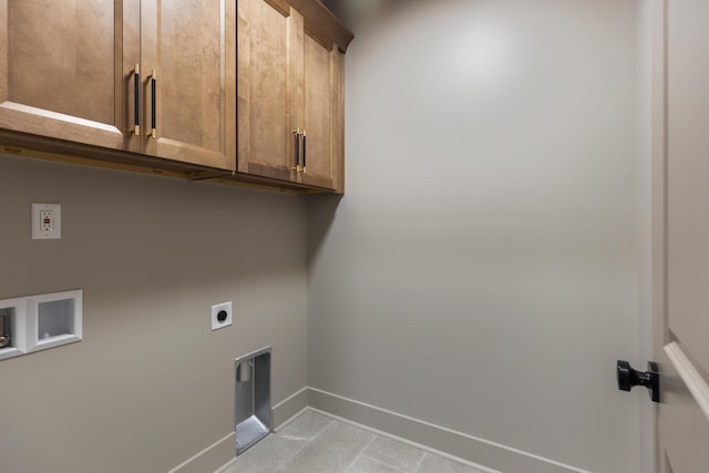 300 Dogwood Ln, Fort Oglethorpe, GA 30742 - laundry room featuring cabinet space, hookup for an electric dryer, and washer hookup
