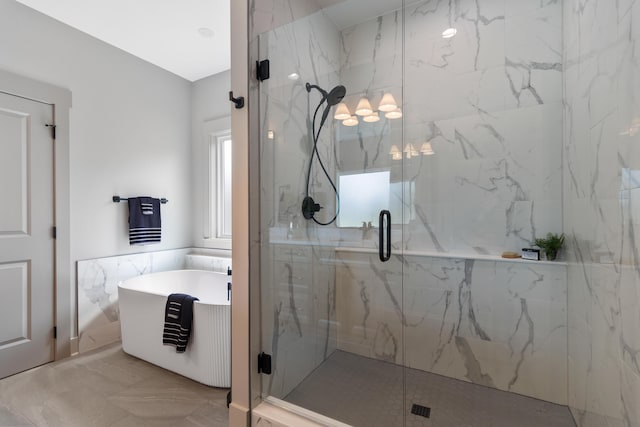 300 Dogwood Ln, Fort Oglethorpe, GA 30742 - bathroom featuring a soaking tub, a marble finish shower, and marble finish floors