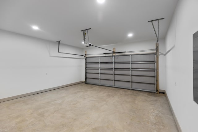 300 Dogwood Ln, Fort Oglethorpe, GA 30742 - garage featuring a garage door opener and recessed lighting