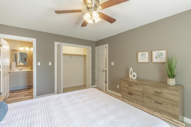 4907 Mccallie Ave, Apison, TN 37302 - bedroom with a closet, ceiling fan, and ensuite bathroom