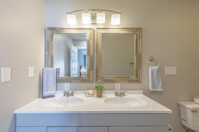 4907 Mccallie Ave, Apison, TN 37302 - bathroom with double vanity and toilet