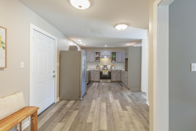4907 Mccallie Ave, Apison, TN 37302 - kitchen featuring appliances with stainless steel finishes, gray cabinets, light wood finished floors, decorative backsplash, and recessed lighting