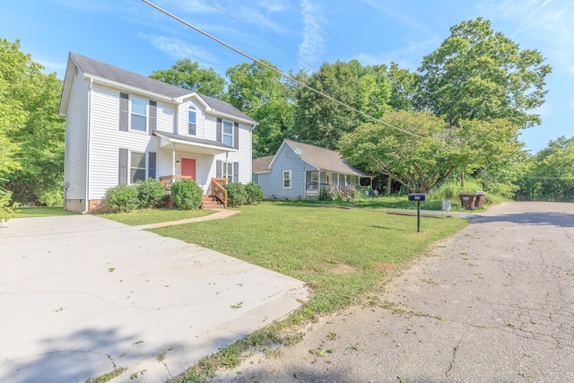 4907 Mccallie Ave, Apison, TN 37302 - view of front of property featuring a front lawn and driveway