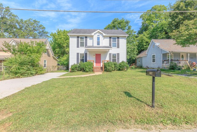 4907 Mccallie Ave, Apison, TN 37302 - colonial home featuring a front yard and a porch
