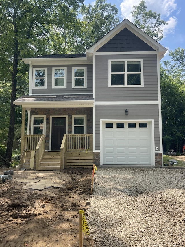 6683 Sandswitch Rd, Hixson, TN 37343 - view of front facade with a porch, driveway, and an attached garage