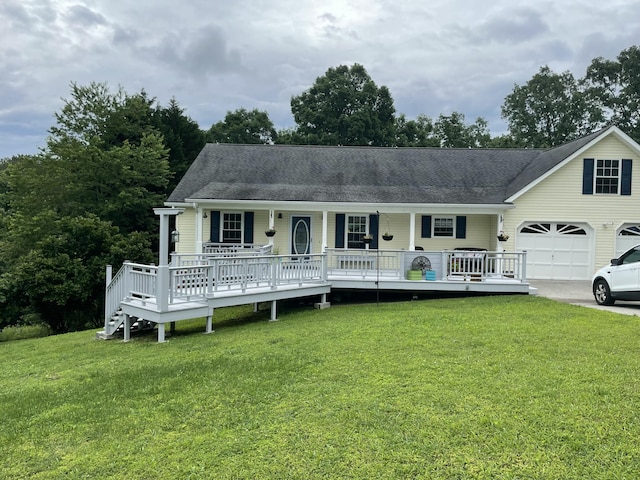 610 Hickory Ridge Trl, Ringgold, GA 30736 - view of front of property featuring covered porch, a front lawn, concrete driveway, and a shingled roof