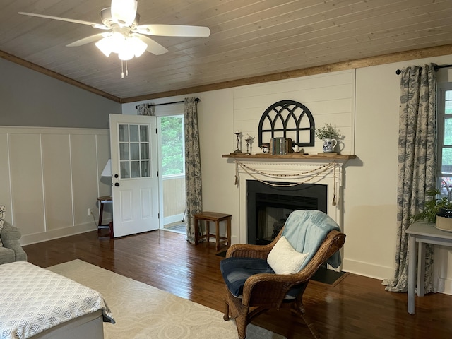 610 Hickory Ridge Trl, Ringgold, GA 30736 - living room featuring a decorative wall, wood finished floors, a fireplace, ceiling fan, and crown molding