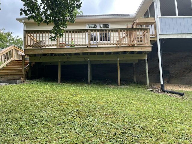 610 Hickory Ridge Trl, Ringgold, GA 30736 - rear view of property featuring a lawn, stairway, and a deck
