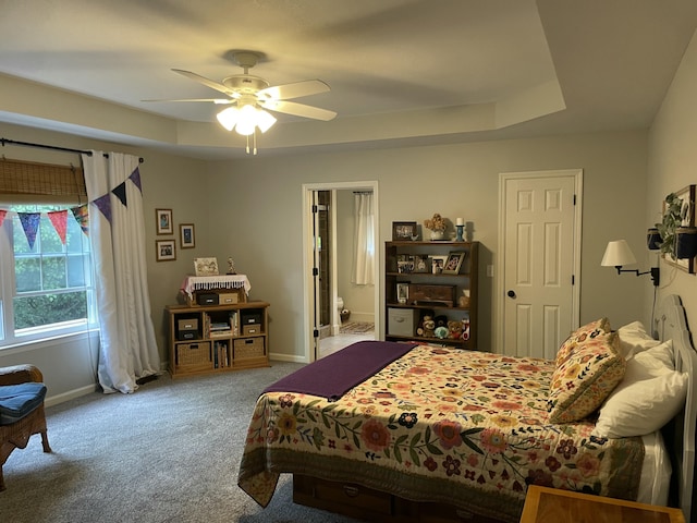 610 Hickory Ridge Trl, Ringgold, GA 30736 - bedroom featuring carpet flooring, baseboards, a tray ceiling, and ceiling fan
