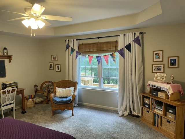 610 Hickory Ridge Trl, Ringgold, GA 30736 - carpeted bedroom featuring a raised ceiling, baseboards, and a ceiling fan