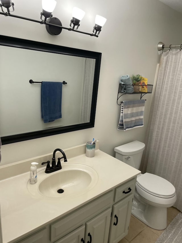 610 Hickory Ridge Trl, Ringgold, GA 30736 - bathroom featuring vanity, tile patterned flooring, toilet, and a shower with shower curtain
