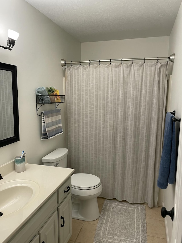 610 Hickory Ridge Trl, Ringgold, GA 30736 - bathroom with vanity, tile patterned floors, and toilet