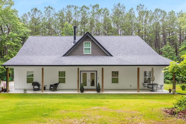 8331 Troubadour Way, Ooltewah, TN 37363 - back of property with french doors, roof with shingles, and a yard