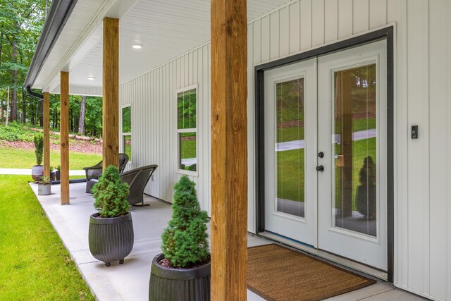 8331 Troubadour Way, Ooltewah, TN 37363 - doorway to property featuring french doors and a porch
