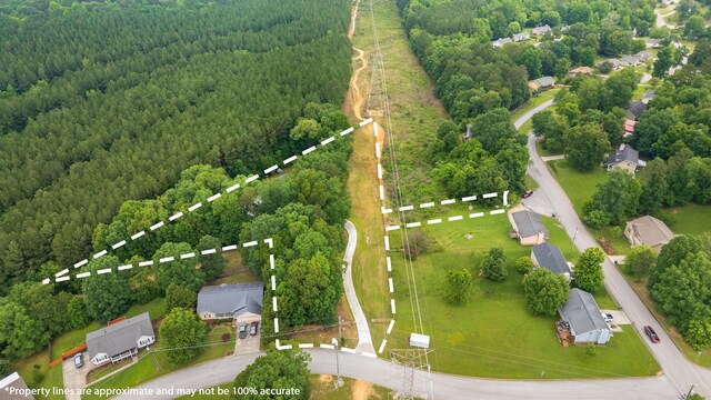 8331 Troubadour Way, Ooltewah, TN 37363 - aerial view of property's location with a heavily wooded area and property parcel outlined