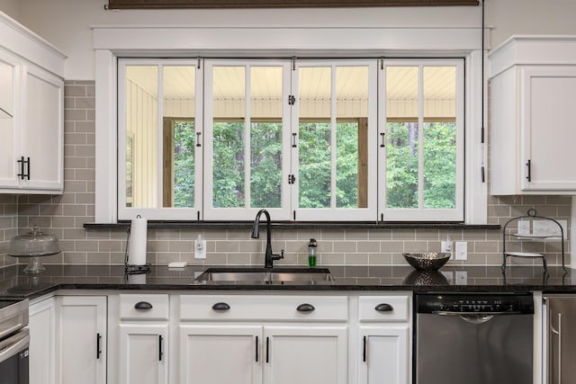 8331 Troubadour Way, Ooltewah, TN 37363 - kitchen featuring dishwasher, a sink, decorative backsplash, and white cabinets