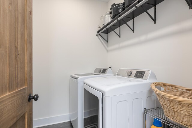 8331 Troubadour Way, Ooltewah, TN 37363 - laundry area featuring washing machine and dryer and baseboards