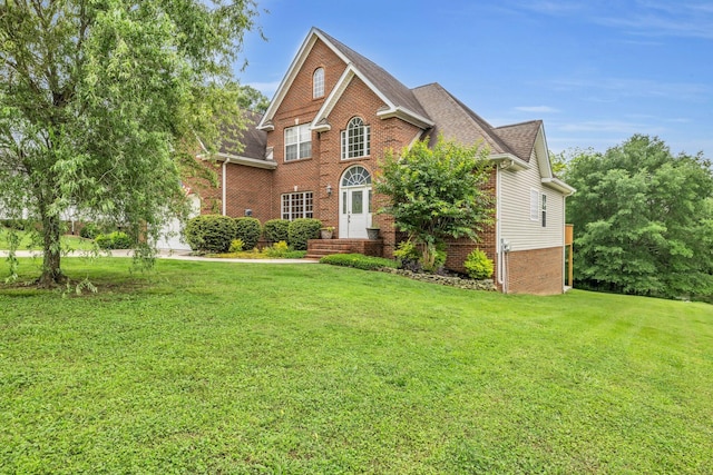 57 Clear Springs Dr, Ringgold, GA 30736 - view of front of home with brick siding, a front lawn, and roof with shingles